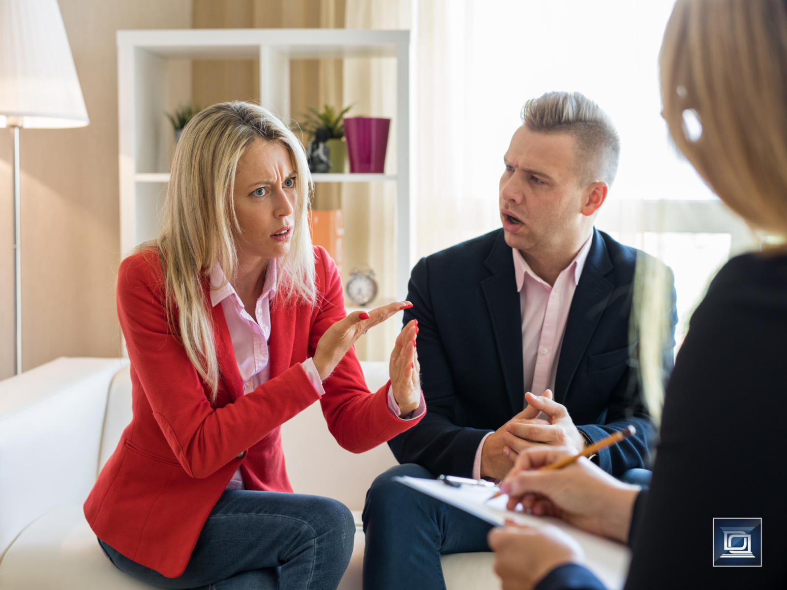 a couple arguing in mediation about their cohabitation agreement