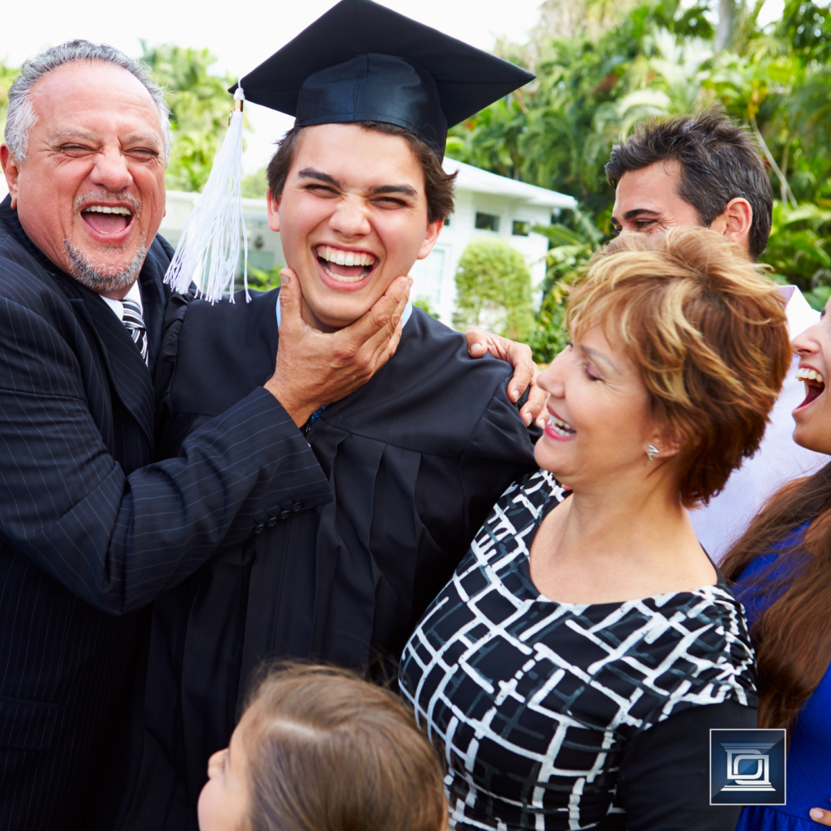divorced parents in BC celebrating joint custody child's graduation